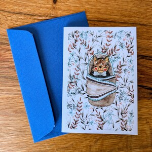 délicate carte pour un nouveau-né, une fête prénatale ou un baptême | Carte florale bébé chat