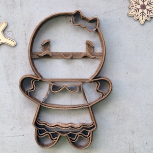 Weihnachtsplätzchenausstecher Lebkuchenmann Mädchen - Lebkuchenmädchen Weihnachtsplätzchenausstecher. Weihnachtsplätzchenausstecher. Weihnachtsplätzchenausstecher.