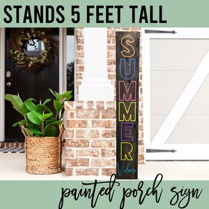 May include: A dark wooden porch sign that is 5 feet tall, with the word "SUMMER" in colorful outlined letters and the words "Vibes" in a script font. The sign is painted with a black background and is displayed on a porch.