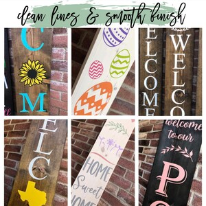 May include: A collection of wooden signs with various designs. One sign features a sunflower and the letter "M". Another displays Easter eggs. Other signs say "WELCOME", "HOME Sweet HOME", and "welcome to our".