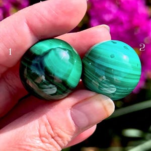 May include: A set of three ceramic mugs with a speckled, matte finish. The mugs are in shades of cream, light gray, and dark gray. Each mug has a simple, minimalist design, perfect for coffee or tea.