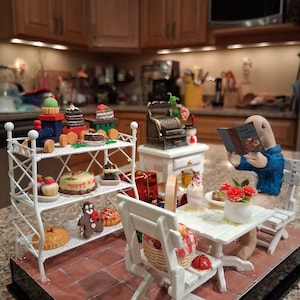 Willy, the Worried Worm, in a Bakery! This bake shop diorama is a finished, completed shadowbox, not a toy. All items are glued in place.
