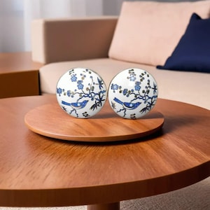 Handgeschilderde keramische kastknoppen: vogel- en boomontwerp