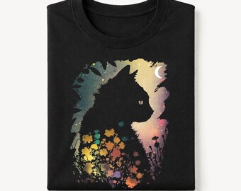 May include: A black t-shirt featuring a graphic print of a cat silhouette in profile. The cat is surrounded by colorful, painterly flowers at the base and a soft, gradient background with a crescent moon, creating a vibrant, artistic contrast.