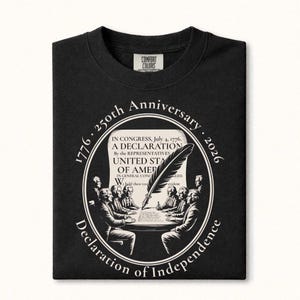 May include: Black crew neck sweatshirt with a circular graphic celebrating the 250th anniversary of the Declaration of Independence. The design includes the text "1776 - 250th Anniversary - 2026" and an illustration of the Declaration's signing.