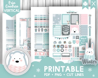 May include: Printable winter planner stickers featuring cute polar bears, bunnies, and snowflakes. The stickers are in a light blue and pink color scheme and include phrases like "Season's Greetings with Love" and "Baby it's Cold Outside".