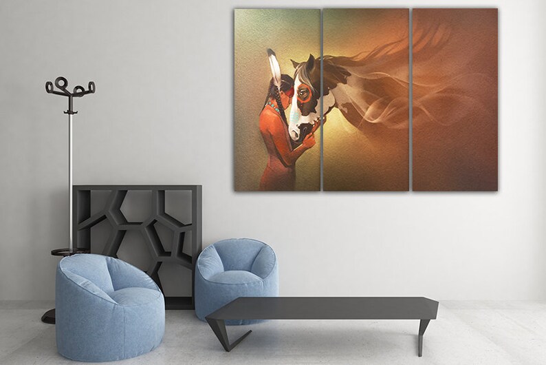 May include: A three-panel canvas print featuring a Native American woman with a headdress, embracing a white and brown horse. The background is a soft, golden brown with a hint of green.