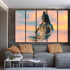 May include: A multi-panel canvas print featuring a depiction of Shiva, a Hindu deity, meditating in a serene setting. The image is set against a backdrop of soft, pastel clouds with a warm, golden glow.