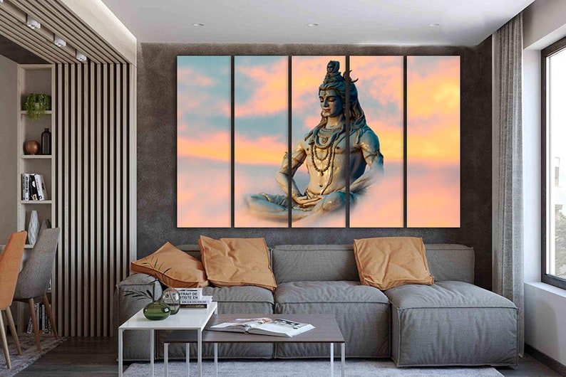 May include: A multi-panel canvas print featuring a depiction of Shiva, a Hindu deity, meditating in a serene setting. The image is set against a backdrop of soft, pastel clouds with a warm, golden glow.