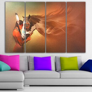 May include: A multi-panel canvas print featuring a Native American woman with a headdress, looking at a brown and white horse with flowing mane. The background is a soft orange and yellow gradient.