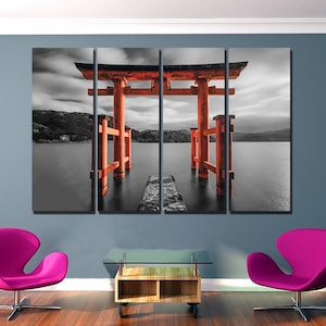 May include: A black and white photograph of a red Japanese Torii gate, a traditional gateway, standing in a body of water. The gate is a popular tourist destination and a symbol of Japanese culture.