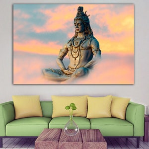 May include: A blue statue of Shiva, a Hindu deity, meditating in a lotus position against a background of pink and orange clouds.