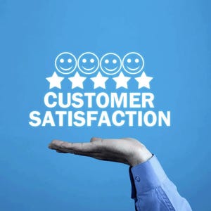 a person holding out their hand with the words customer satisfaction