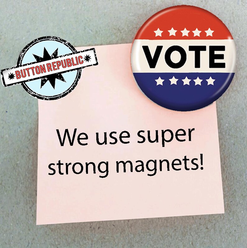 a pink sticky note with the text "We use super strong magnets!" attached to it, along with a red, white, and blue button-shaped magnet that says "VOTE" on it.