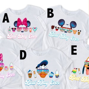 May include: Five white t-shirts with different Disney characters wearing sunglasses and the text "Best Day Ever". The characters are Mickey Mouse, Minnie Mouse, Donald Duck, Goofy, and Daisy Duck.