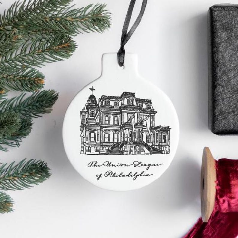 May include: White ceramic ornament with a black and white illustration of a building and the text "The Union League of Philadelphia".