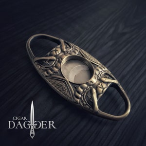 The Cobra Cigar Cutter in Brass
