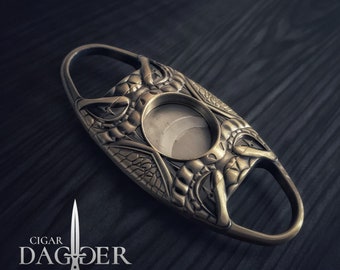 The Cobra Cigar Cutter in Brass