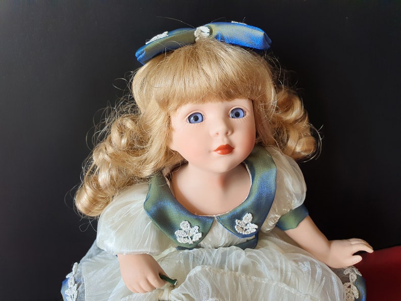 blonde hair porcelain dolls