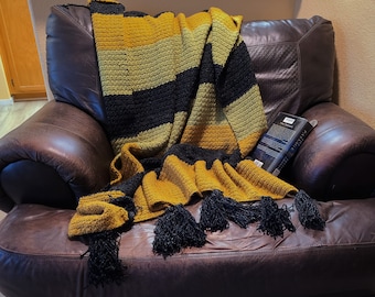Tasseled crocheted afghan