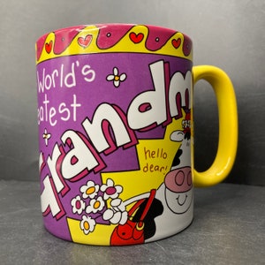Vintage 2001 World’s Greatest Grandma ceramic mug Hello Dear Cow flying a kite The Xpressions Gift Co