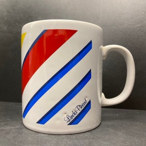 Vintage Kilncraft Linda Beard Textile Designer blue yellow and red diagonally striped ceramic mug made in England Coloroll