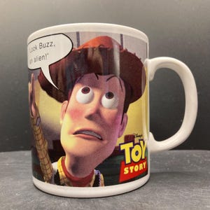 Vintage Disney’s Toy Story Look Buzz an Alien! Ceramic Mug