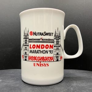 May include: A distressed wooden sign, inscribed with "Welcome to our home" in white lettering. The sign has a rustic finish, ideal for adding a welcoming touch to any home's entrance.