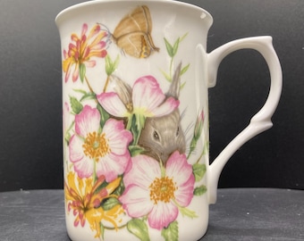 Taza vintage de porcelana de hueso de Staffordshire con diseño floral de conejo y polilla de la colección Royal Burlington, hecha en Inglaterra (con defectos)