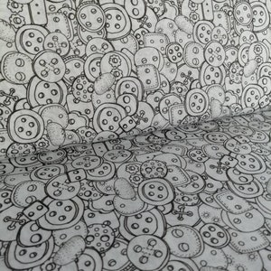 Könnte beinhalten: Eine Schwarzweißillustration eines Stoffes mit einem sich wiederholenden Muster aus Knöpfen. Die Knöpfe sind in verschiedenen Formen und Größen vorhanden, und einige haben Löcher oder Nähdetails.