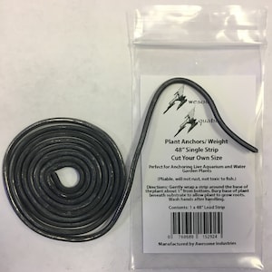 May include: A coiled 48-inch lead strip for anchoring live aquarium and water garden plants. The strip is pliable, rust-proof, and non-toxic to fish. The packaging includes instructions for use and a barcode. The text on the packaging reads: "Plant Anchors/Weight 48" Single Strip Cut Your Own Size Perfect for Anchoring Live Aquarium and Water Garden Plants (Pliable, will not rust, not toxic to fish.) Directions: Gently wrap a strip around the base of the plant about 1" from bottom. Bury base of plant beneath substrate to allow plant to grow roots. Wash hands after handling. Contents: 1 x 48" Lead Strip 0 760680 152924 Manufactured by Awesome Industries"