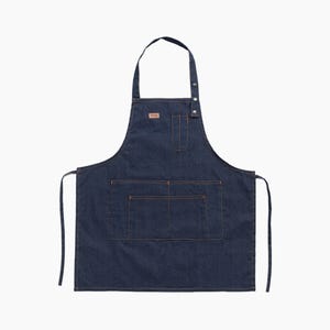 Delantal vaquero con bolsillos: ropa de trabajo ajustable en azul y negro