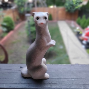 Indoor air brushed ferret statue memorial standing ferret