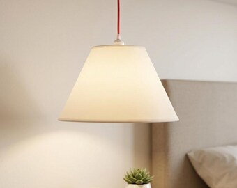 Modern Minimalist Pendant Light | Milky Opal PVC Shade with Red Fabric Cord.