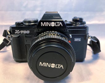 Film Tested Mid 80's Minolta X-700 35mm SLR Camera w/ MD 50mm 1:1.7 Lens, 80-200mm Zoom, Minolta Flash, Instruction Manual.  Working!  #4044