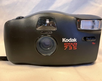 1990's Kodak Star 735 35mm Plastic Film Camera with Case and Instruction Manual. Working Shutter, Flash! #4158
