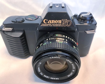 Film Tested 1980's Canon T50 35mm Camera With FD 50mm 1:1.8 Canon Lens and Carrying Case.  Very Good Condition, Working!  #4123