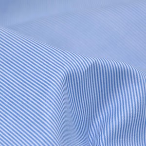 Cotton fabric printed with narrow stripes in blue, white by Makower - 110 cm wide - fabric smooth, stripes