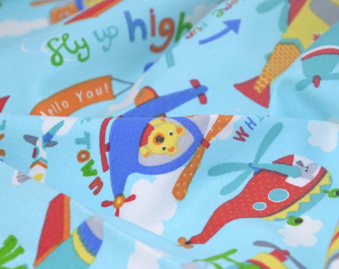 Children's jersey fabric, light blue with airplanes, clouds, and animals, made of cotton - 160 cm wide - patterned fabric, animals