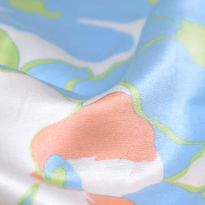 Evening wear cotton, silk, satin with flowers in green, pink and blue - cm wide - fabric shiny, patterned