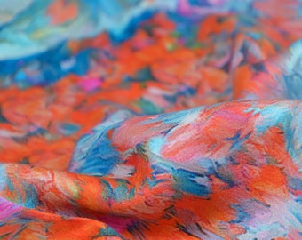 Blousestof satijn van viscose oranje, blauw abstract, jurk, rok - 140 cm breed - stof licht glanzend, patroon