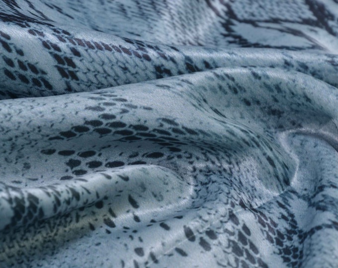Blouse fabric snake pattern petrol turquoise sold by the meter