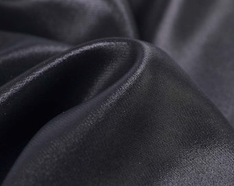 Designerstoff Glitzer Lurex uni in schwarz, Blusen, Kleider - 145cm breit - Stoff glänzend, UNI