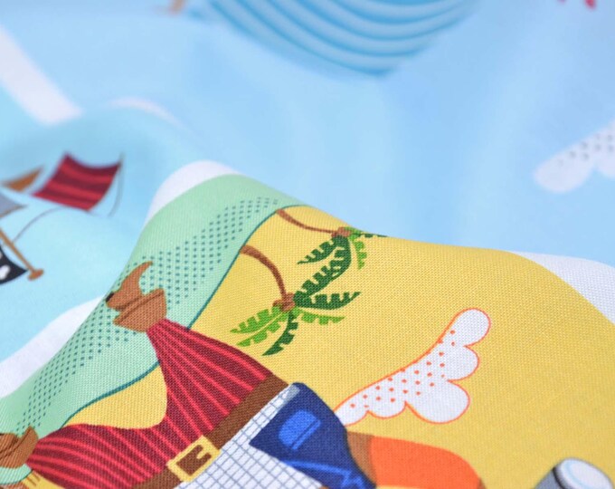 Cotton fabric with pirate and animal print, light blue, orange, brown, white, yellow - 113 cm wide - smooth, patterned fabric