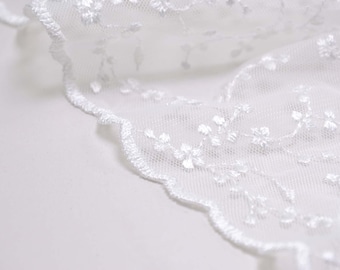 Lace fabric for wedding dresses with small flowers and leaves in white - 115 cm wide - patterned fabric