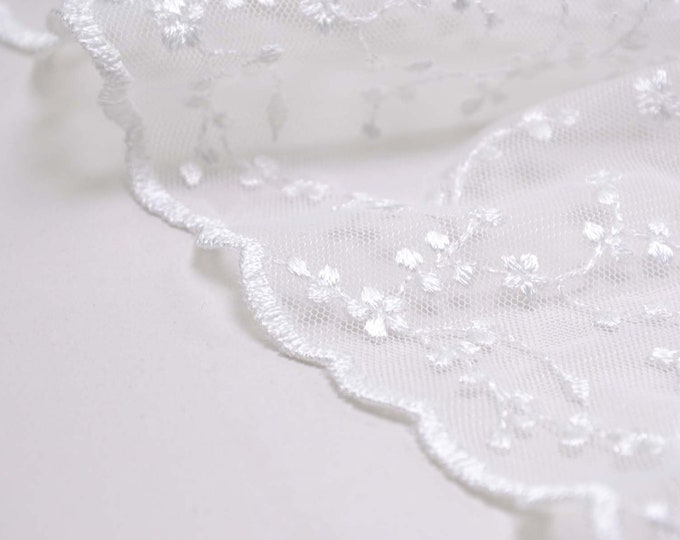 Lace fabric for wedding dresses with small flowers and leaves in white - 115 cm wide - patterned fabric