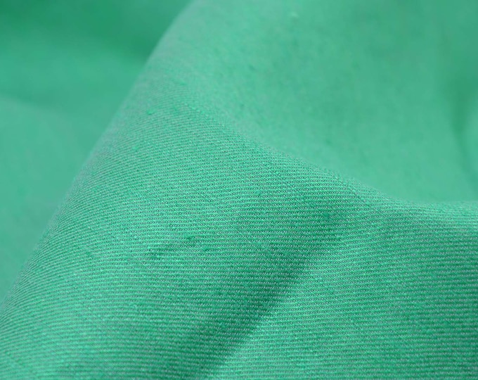 Leinenstoff mit Stretch in uni grün für Hosen, Kleider, Röcke - 145cm breit - Stoff matt, UNI