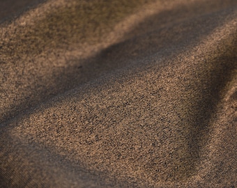 Abendmode Sweatstoff aus Baumwolle in Gold Glitzer - 150cm breit - Stoff meliert UNI
