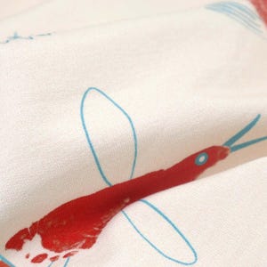 Sweat fabric white with red blue birds made of cotton - 150 cm wide - fabric smooth, animals