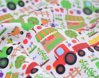 May include: White fabric with a repeating pattern of red and green tractors, apple trees, farm stands, and other farm-related imagery.
